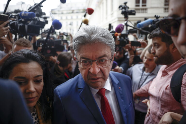 epa11467955 Leader of the left-wing party La France Insoumise (LFI) Jean-Luc Melenchon (C) arrives at the National Assembly in Paris, France, 09 July 2024. France voted in the second round of the legislative elections on 07 July. According to the official results, the left-wing New Popular Front (Nouveau Front populaire, NFP) was ahead of President Macron's party and Le Pen's far-right National Rally (RN). EPA/YOAN VALAT