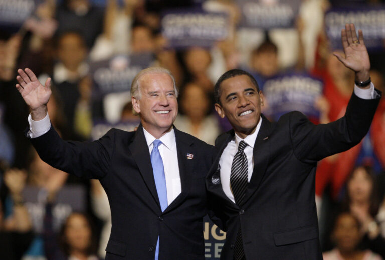 FILE - Vice presidential candidate Joe Biden, D-Del., left, and Democratic presidential candidate Sen. Barack Obama, D-Ill., right, wave during a rally in Sunrise, Fla., Wednesday, Oct. 29, 2008. Historians and political advisers say history will be kinder to President Joe Biden than voters have been. Biden dropped out of the presidential race Sunday, July 21, 2024, clearing the way for a new Democratic nominee. (AP Photo/Lynne Sladky, File)