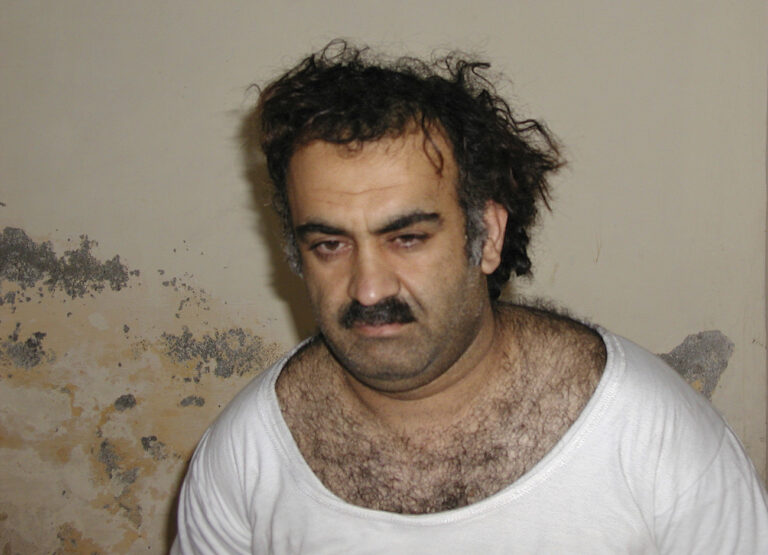 FILE- Khalid Sheikh Mohammed, the alleged Sept. 11 mastermind, is seen shortly after his capture during a raid in Pakistan Saturday March 1, 2003 in this photo obtained by the Associated Press. The man accused of being the main plotter in al-Qaeda's Sept. 11, 2001 attacks has agreed to plead guilty, The Defense Department said Wednesday. (AP Photo, FILE)