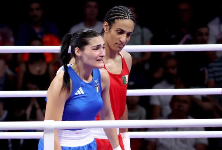 epa11515317 Angela Carini (L) of Italy abandons her bout in the Women 66kg preliminaries round of 16 against Imane Khelif of the Boxing competitions in the Paris 2024 Olympic Games, at the North Paris Arena in Villepinte, France, 01 August 2024. EPA/YAHYA ARHAB
