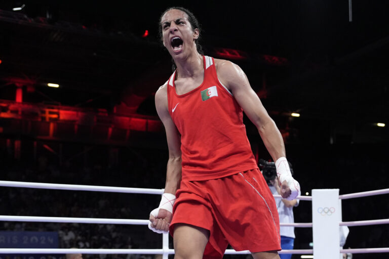 Algeria's Imane Khelif celebrates after defeating Hungary's Anna Hamori in their women's 66kg quarterfinal boxing match at the 2024 Summer Olympics, Saturday, Aug. 3, 2024, in Paris, France. (AP Photo/John Locher)