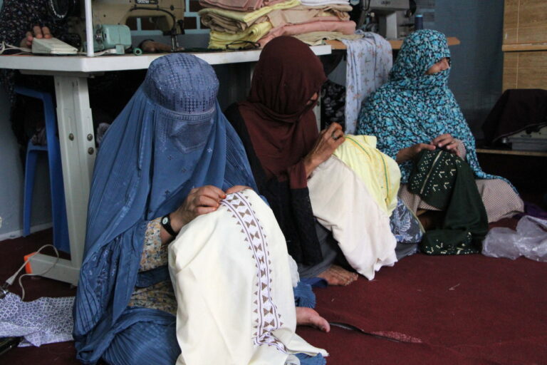 epa11584436 Afghan women stitch clothes at a workshop in Kandahar, Afghanistan, 04 September 2024. In Kandahar, 55-year-old Khadija, a widow herself, has taken the initiative to empower 60 widows and impoverished women by providing them with employment opportunities through tailoring and handicrafts. Despite the challenges posed by the current restrictions on women's work under the Taliban government, Khadija has found a way to create jobs for women within the confines of their homes. She advocates for the establishment of a special market for women, which would help meet their economic needs and provide them with a platform to showcase their skills. This initiative highlights the resilience and resourcefulness of women in Afghanistan, as they continue to seek ways to support their families and contribute to their communities. EPA/QUDRATULLAH RAZWAN