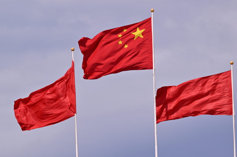 epa11585810 China?s national flag flutters during the Forum on China-Africa Cooperation (FOCAC) summit at the Great Hall of the People in Beijing, China, 05 September 2024. EPA/ADEK BERRY / POOL