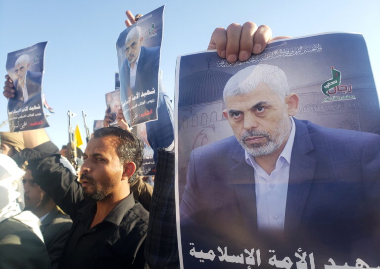 epa11666619 Houthi supporters hold signs showing late Hamas leader Yahya Sinwar during a rally in solidarity with the Lebanese and Palestinian people, one day after the Hamas leader's killing in Gaza, in Sana'a, Yemen, 18 October 2024. The Israeli Army, Tsahal, on 17 October 2024 confirmed that Hamas leader Yahya Sinwar was 'eliminated' on 16 October 'after a year-long pursuit'. Thousands of people participated in the rally in solidarity with the Lebanese and Palestinian people and to condemn the US support for Israel's military operations in Lebanon and the Gaza Strip, amid high tensions in the Middle East. EPA/YAHYA ARHAB