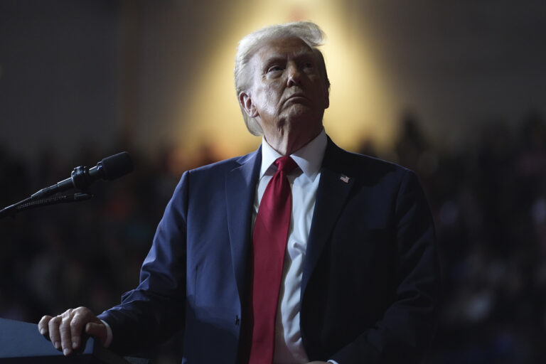 Republican presidential nominee former President Donald Trump watches a video screen at a campaign rally at the Salem Civic Center, Saturday, Nov. 2, 2024, in Salem, Va. (AP Photo/Evan Vucci).Donald Trump