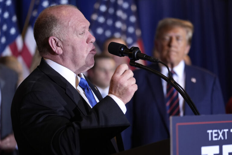 FILE -Tom Homan speaks as Republican presidential candidate former President Donald Trump listens at a primary election night party in Nashua, N.H., Jan. 23, 2024. (AP Photo/Matt Rourke), File)