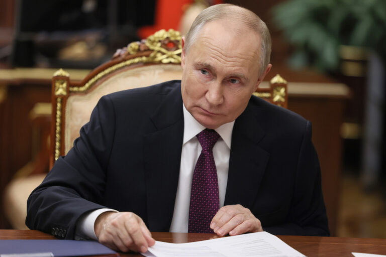 Russian President Vladimir Putin meets with First Deputy Prime Minister Denis Manturov at the Kremlin, in Moscow, Russia, Wednesday, Nov. 20, 2024. (Vyacheslav Prokofyev, Sputnik, Kremlin Pool Photo via AP)