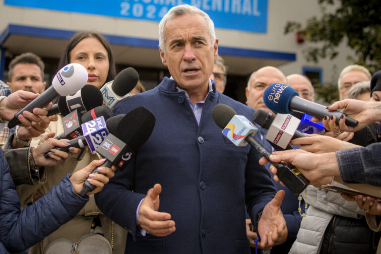 Calin Georgescu, running as an independent candidate for president, speaks to media after registering his bid in the country's presidential elections, in Bucharest, Romania, Tuesday, Oct. 1, 2024. (AP Photo/Alexandru Dobre)