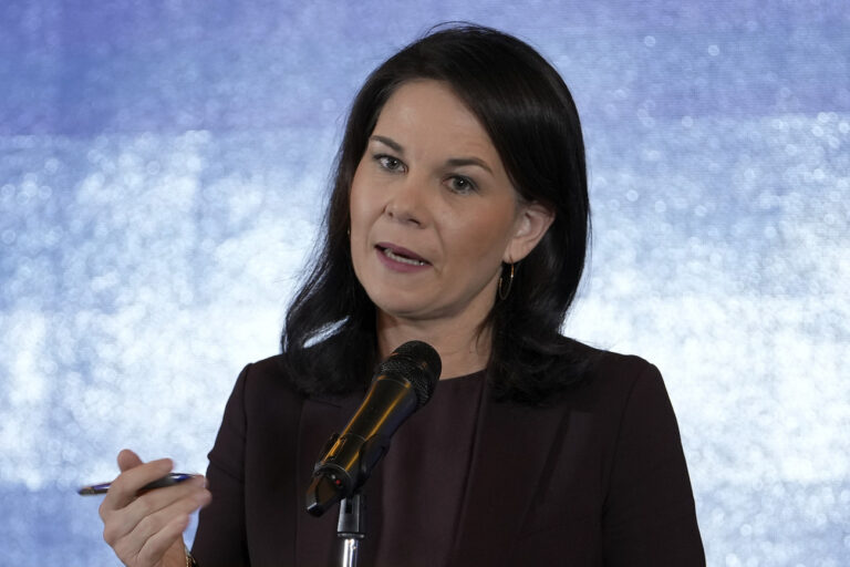 German Foreign Minister Annalena Baerbock speaks during a press briefing at a hotel in Beijing, Monday, Dec. 2, 2024. (AP Photo/Andy Wong)