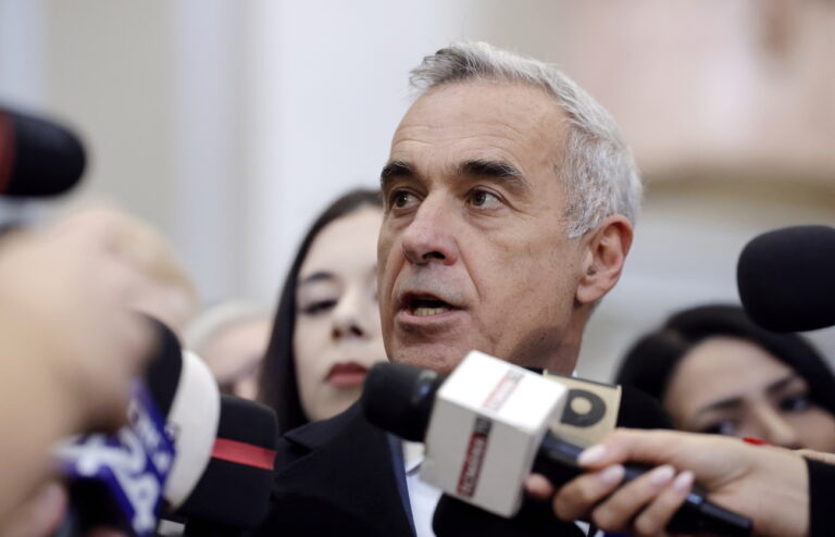 epa11785413 Calin Georgescu, Romania's independent candidate who won the first round of the annulled presidential elections, makes a media statement inside the Appeal Court (CAB) headquarters in Bucharest, Romania, 19 December 2024. Georgescu filed on 16 December a lawsuit with the ICCJ (High Court of Cassation and Justice) to annul the decision of the Central Electoral Bureau (BEC), which suspended the second round of the presidential elections following a ruling on 06 December by the Romanian Constitutional Court (CCR) on the annulment of the elections first round. The trial was postponed by the judge to 23 December. EPA/ROBERT GHEMENT