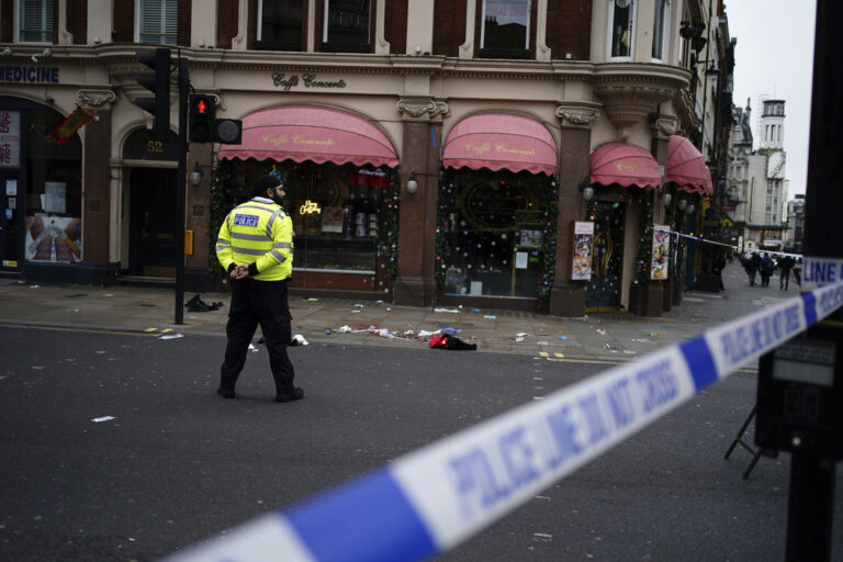 The scene on Shaftesbury Avenue in central London after four people were injured, one seriously, by a car which was driven onto a pavement in central London in the early hours of Christmas Day, Wednesday, Dec. 25, 2024. (Jordan Pettitt/PA via AP)