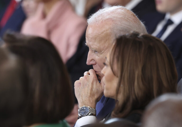 Former President Joe Biden, left, and former Vice President Kamala Harris listen as President Donald Trump speaks after taking the oath of office at the 60th Presidential Inauguration in the Rotunda of the U.S. Capitol in Washington, Monday, Jan. 20, 2025. (Kevin Lamarque/Pool Photo via AP)