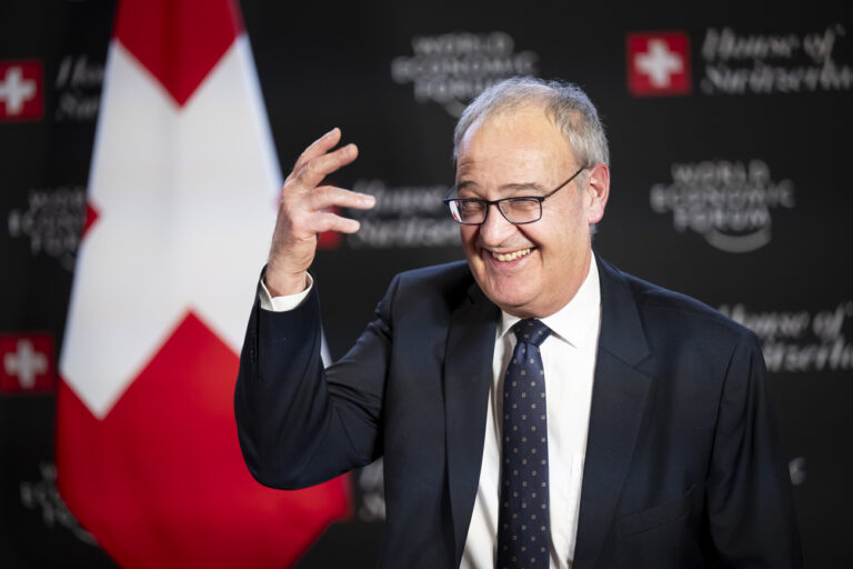 Switzerland's Economy Minister Federal Councillor Guy Parmelin, reacts during a press conference at the House of Switzerland, HoS, on the sideline of the 55th annual meeting of the World Economic Forum, WEF, in Davos, Switzerland, Thursday, January 23, 2025. (KEYSTONE/Laurent Gillieron)