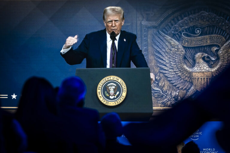 US President Donald Trump is shown on screens as he addresses via videolink a plenary session in the Congress Hall during the 55th annual meeting of the World Economic Forum, WEF, in Davos, Switzerland, on Thursday, January 23, 2025. (KEYSTONE/Michael Buholzer)