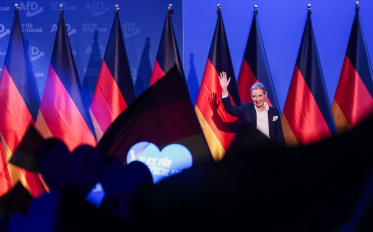 epa11852620 Alternative for Germany (AfD) party and faction co-chairwoman and top candidate for the federal election Alice Weidel receives standing ovations after her speech during the election campaign launch in Halle, Germany, 25 January 2025. Germany will hold early federal elections on 23 February 2025. EPA/HANNIBAL HANSCHKE