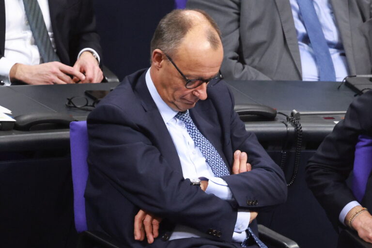 epa11860959 Chairman of the Christian Democratic Union (CDU) party and faction Friedrich Merz looks on after a motion of the Christian Democratic Union (CDU) won a majority during a session of the German parliament 'Bundestag' in Berlin, Germany, 29 January 2025. One of the main topics of session of the Bundestag is the delivery of a government statement by German Chancellor Olaf Scholz on current domestic policy issues. EPA/CLEMENS BILAN