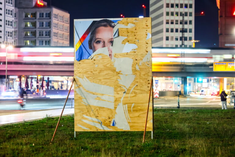 epa11870866 A damaged campaign poster of the Alternative for Germany (AfD) party and faction co-chairwoman and top candidate for the federal election, Alice Weidel, is on display after a gathering of protesters for a rally in Berlin, Germany, 02 February 2025. People gathered to protest against the Christian Democratic Union's (CDU) cooperation with the far-right Alternative for Germany (AfD) party after the CDU's motion in the Bundestag won a majority with the help of AfD votes. This is a novelty, as the CDU wanted to maintain a so-called 'firewall' regarding cooperation with the far-right party. EPA/HANNIBAL HANSCHKE