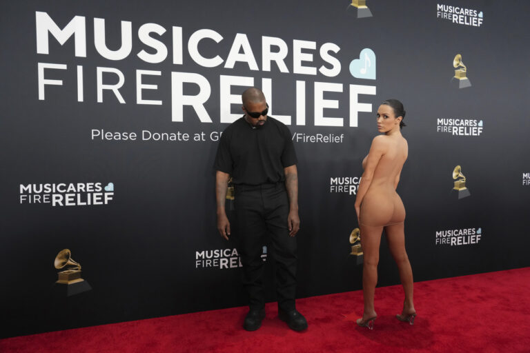 Kanye West, left, and Bianca Censori arrive at the 67th annual Grammy Awards on Sunday, Feb. 2, 2025, in Los Angeles. (Photo by Jordan Strauss/Invision/AP)