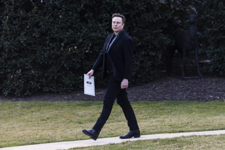 epa11948068 US Department of Government Efficiency's (DOGE) Elon Musk (C) walks behind US President Donald Trump (not pictured) as they depart the White House for Florida in Washington, DC, USA, 07 March 2025. EPA/JIM LO SCALZO