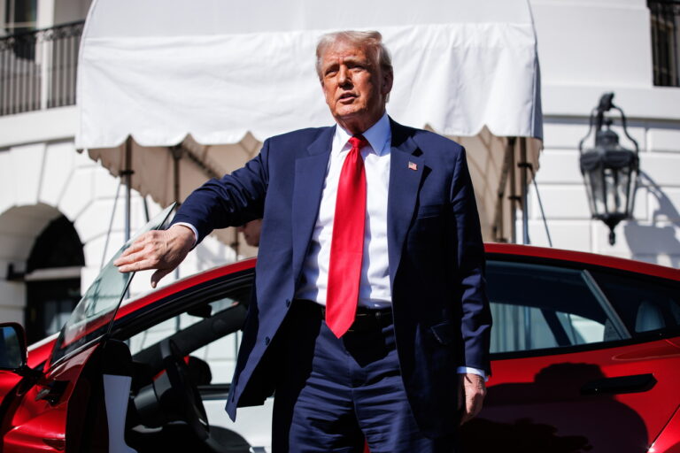 epa11957122 US President Donald Trump climbs out of a Tesla Model S on the South Lawn of the White House in Washington, D.C., USA, 11 March 2025. President Trump has said he will buy a Tesla to support Tesla and Elon Musk after recent attacks on Tesla charging stations and calls for boycotts of Tesla products. EPA/SAMUEL CORUM / POOL