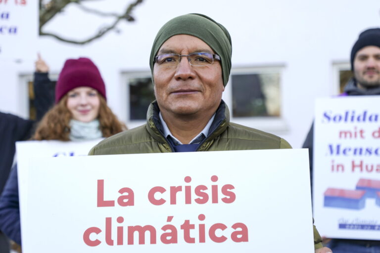 epa11973155 Peruvian farmer Saul Lliuya waits for his trial against RWE AG at the Higher Regional Court in Hamm, Germany, 19 March 2025. The fifth Civil Senate of the Higher District Court of Hamm wants to conduct an oral hearing in the appeal of the Peruvian farmer and mountain guide Saul Luciano Lliuya. In this climate justice lawsuit, German electrical energy company RWE may be partially responsible for protective measures against climate change in the high Andes of Peru. EPA/CHRISTOPHER NEUNDORF