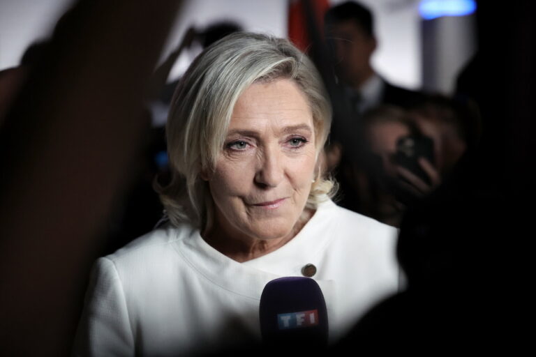 epaselect epa11465845 Member of Parliament for the French right-wing party National Rally (Rassemblement National, RN), Marine Le Pen addresses journalists at the party's headquarters after preliminary results of the second round of the French parliamentary elections, in Paris, France, 07 July 2024. France voted in the second round of the legislative elections on 07 July. According to the first official results, the left-wing New Popular Front (Nouveau Front populaire, NFP) was ahead of President Macron's party and Le Pen's far-right National Rally (RN). EPA/CHRISTOPHE PETIT TESSON